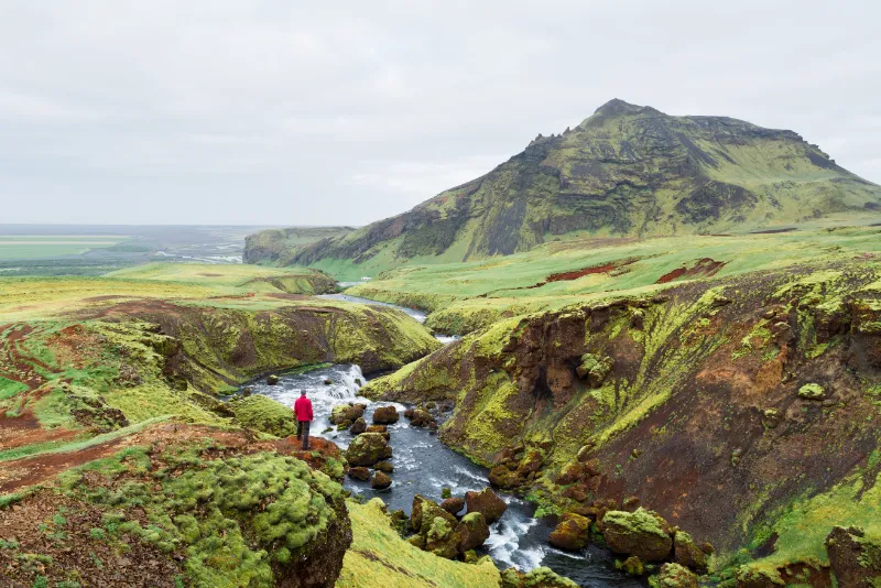 tourist on a hike in iceland near the skoga river 2023 03 15 01 43 31 utc