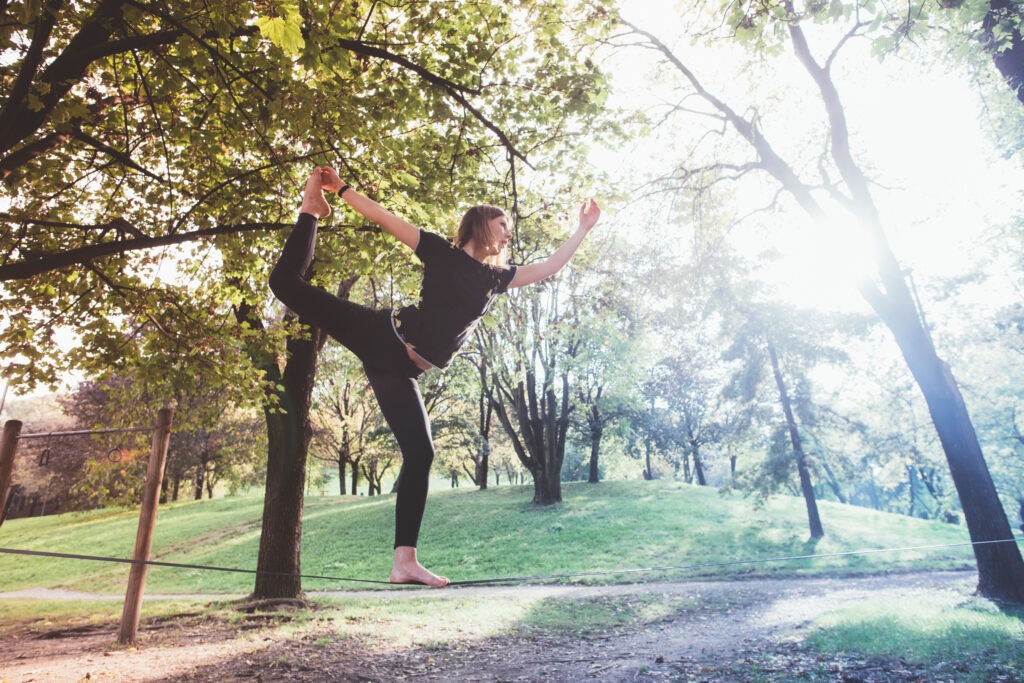 woman balancing a tightrope outdoor 2022 02 24 02 44 49 utc